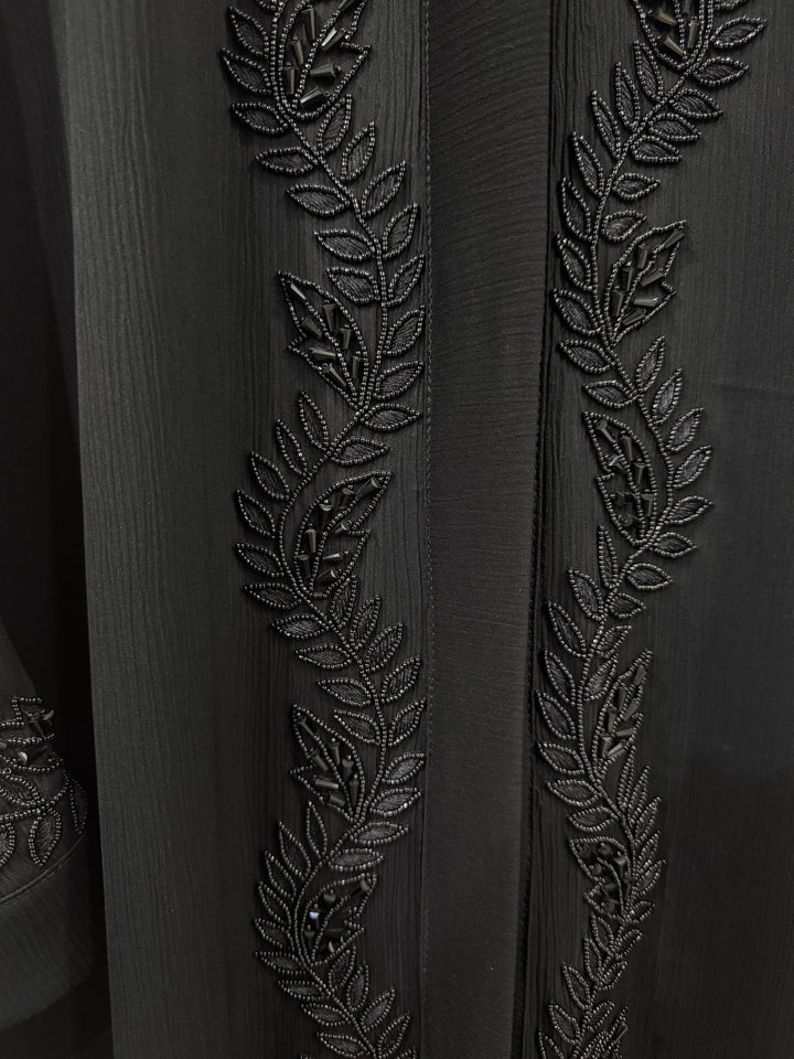 Modest wear abaya with stylish front handwork – timeless fashion for modern women.