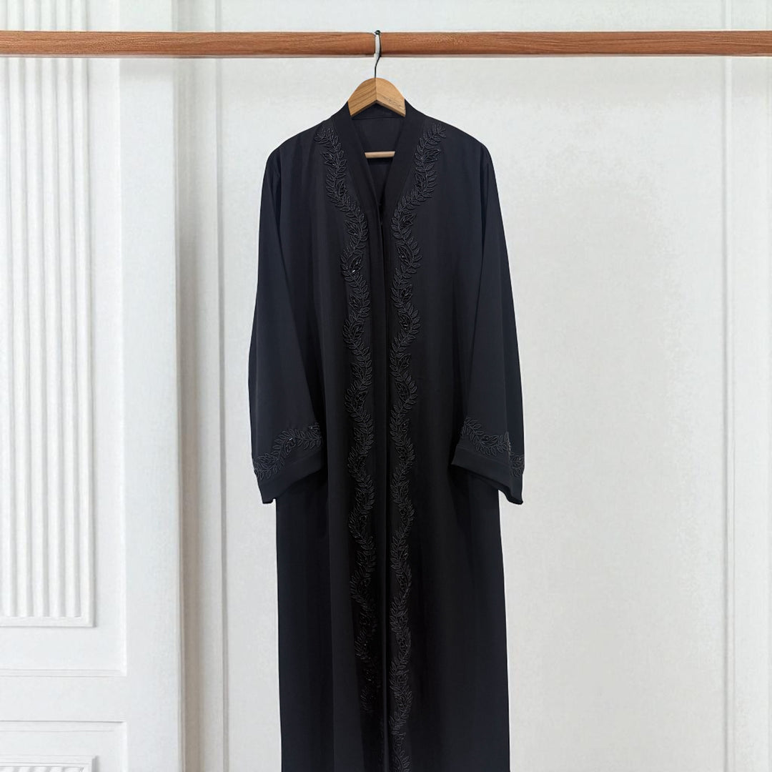 Modest wear abaya with stylish front handwork – timeless fashion for modern women.