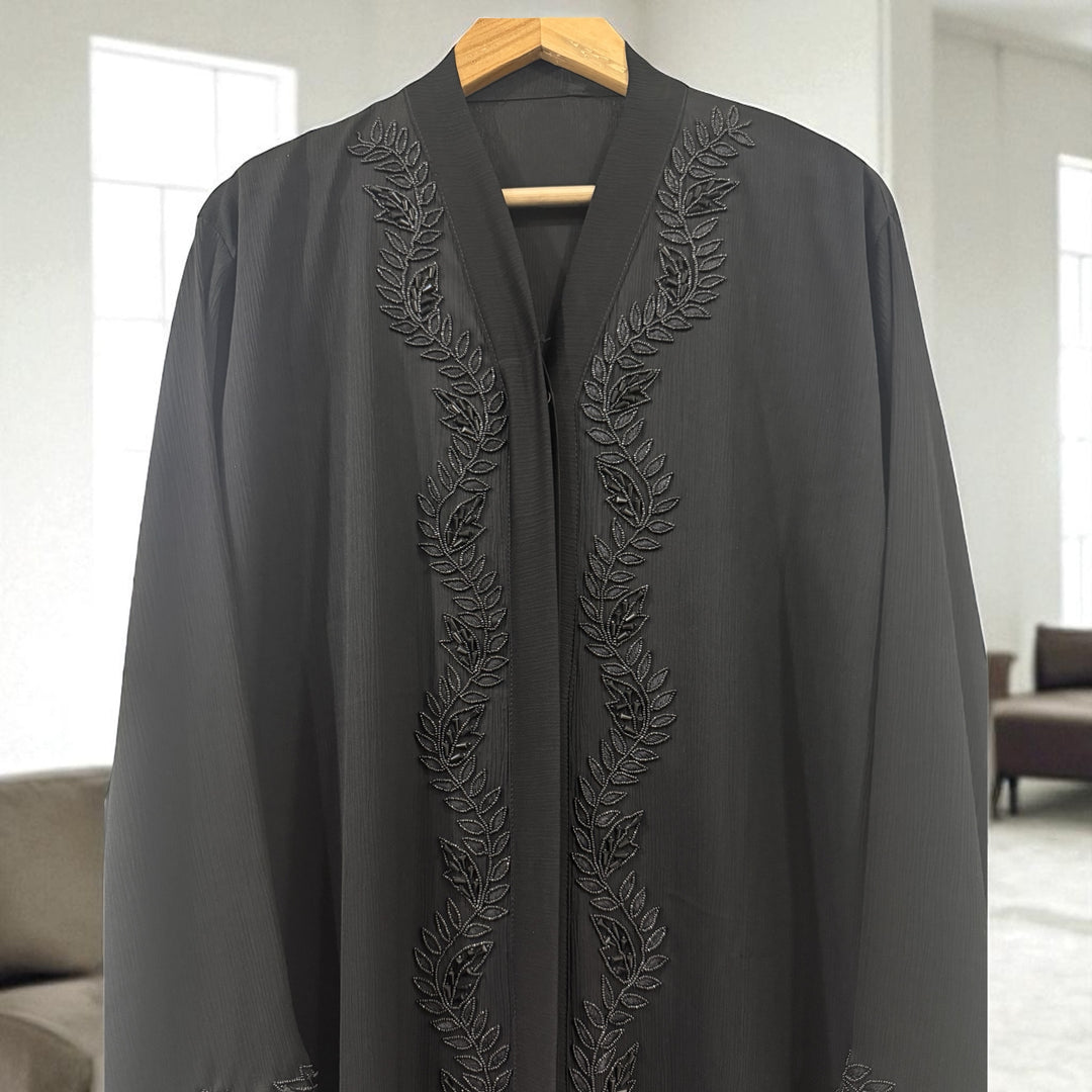Modest wear abaya with stylish front handwork – timeless fashion for modern women.
